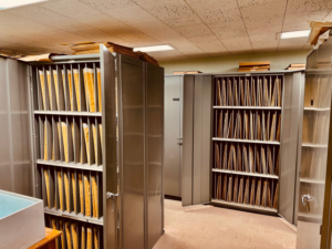 Tall cabinets filled with folders used to store glass plates.